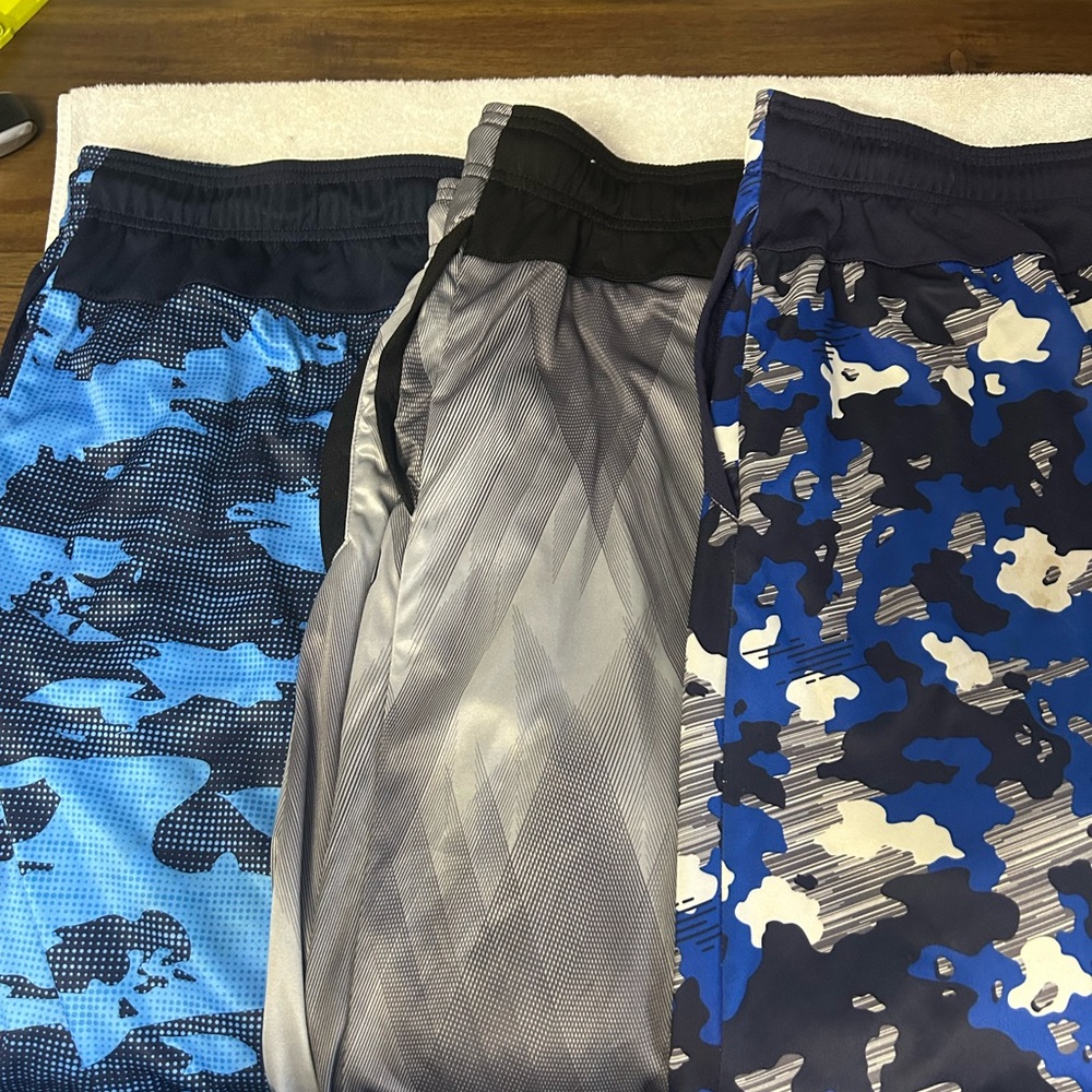 3 pairs of AND1 Blue Camouflage, Blue/Dark Blue, and Gray with Red trim Shorts.